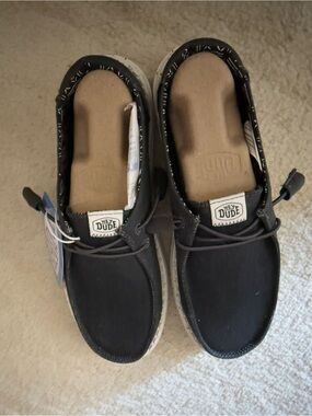 Hey Dude Black Canvas Slip-Ons with Speckled White Soles